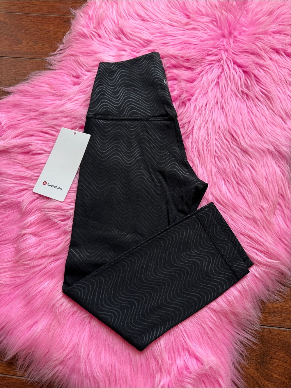 Size 4 Lululemon Align High-Rise Crop 21"
Aqueous Emboss Black NWT